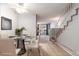 Dining area with glass table and white chairs at 1711 S Blackhawk Way # D, Aurora, CO 80012