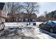 Townhouse exterior view with parking and walkway at 1711 S Blackhawk Way # D, Aurora, CO 80012