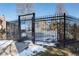 Community pool area with locked gate and signage at 1711 S Blackhawk Way # D, Aurora, CO 80012