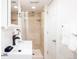 Clean bathroom featuring a tile shower, modern fixtures, and a bright, white color scheme at 3445 N Clay St, Denver, CO 80211