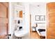 Charming bathroom with vintage-style sink, medicine cabinet, and adjacent bedroom at 3445 N Clay St, Denver, CO 80211
