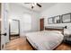 Bedroom featuring a neutral color scheme and hardwood flooring at 3445 N Clay St, Denver, CO 80211
