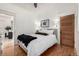 Cozy bedroom with hardwood floors and stylish decor at 3445 N Clay St, Denver, CO 80211