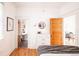 Stylish bedroom offering great natural light and ensuite bath access at 3445 N Clay St, Denver, CO 80211