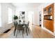 Bright dining room featuring a modern table, comfortable seating, and ample natural light at 3445 N Clay St, Denver, CO 80211