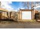 Detached garage offers ample parking and storage space in a well-maintained backyard setting at 3445 N Clay St, Denver, CO 80211