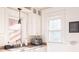 Charming kitchen with granite countertops, white cabinets, and natural light at 3445 N Clay St, Denver, CO 80211