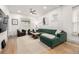 Spacious living room with a comfortable sectional sofa, area rug, and natural light at 3445 N Clay St, Denver, CO 80211