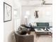 Bright and inviting living room featuring neutral colors and modern decor at 3445 N Clay St, Denver, CO 80211