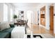 Open-concept living and dining area with hardwood floors and natural light at 3445 N Clay St, Denver, CO 80211