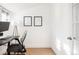 Bright office with a desk, chair, and a modern lamp and wall art at 3445 N Clay St, Denver, CO 80211