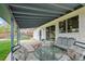 Cozy patio with seating area, ideal for outdoor lounging and enjoying the peaceful backyard setting at 4525 S Cole Ct, Morrison, CO 80465