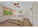 Inviting bedroom featuring a ceiling fan and great natural light at 4525 S Cole Ct, Morrison, CO 80465