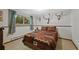 Bedroom with southwestern bedding, decor, and views of the outdoors at 4525 S Cole Ct, Morrison, CO 80465