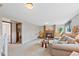 Comfortable living room with brick fireplace and walk-out access at 4525 S Cole Ct, Morrison, CO 80465