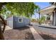 Exterior of the property showing the guest house and the backyard at 1765 Xenia St, Denver, CO 80220