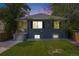 Charming home with a well-maintained lawn and inviting front porch at 1765 Xenia St, Denver, CO 80220