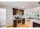 Kitchen featuring stainless steel oven, microwave, and granite countertops at 1765 Xenia St, Denver, CO 80220