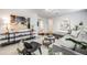 Modern living room with stylish decor, comfortable seating, and hardwood floors at 1765 Xenia St, Denver, CO 80220