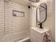 Modern bathroom with subway tiles, sleek fixtures, and a clean design at 1374 N Ogden St # C, Denver, CO 80218