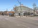 Street view of a commercial building with outdoor seating on a sunny day at 1374 N Ogden St # C, Denver, CO 80218