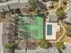 Overhead view of the community tennis courts and covered swimming pool at 3471 S Ammons St # 12-6, Lakewood, CO 80227
