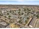 Wide aerial shot showcasing the neighborhood's layout and surrounding landscape at 3471 S Ammons St # 12-6, Lakewood, CO 80227