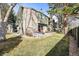 Landscaped backyard and patio area, providing a cozy outdoor space at 3471 S Ammons St # 12-6, Lakewood, CO 80227