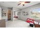 Spacious Bedroom with mirrored closet, plush carpet and a window with bright, natural light at 3471 S Ammons St # 12-6, Lakewood, CO 80227