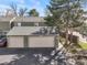 View of the two car garages in the property at 3471 S Ammons St # 12-6, Lakewood, CO 80227