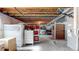 Spacious unfinished basement featuring exposed ceiling and utilities, perfect for storage or future expansion at 5280 Longs Peak St, Brighton, CO 80601