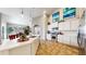 Bright kitchen boasts granite countertops, stainless steel appliances, and an open layout perfect for entertaining at 5280 Longs Peak St, Brighton, CO 80601