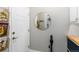 Practical laundry room with built-in shelves and ample storage for cleaning supplies and household items at 9690 E 5Th Ave, Denver, CO 80230