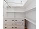 Efficient closet with shelving and drawers, providing plenty of storage and organizational space at 761 N Lafayette St, Denver, CO 80218