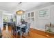 Elegant dining room with hardwood floors, built-in cabinets, and modern light fixture at 761 N Lafayette St, Denver, CO 80218