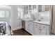 Modern kitchen featuring marble countertops, stainless steel appliances, and ample cabinet space at 761 N Lafayette St, Denver, CO 80218