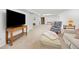Finished basement offering a large TV, soft seating and ample room for activities at 2871 Humboldt Cir, Longmont, CO 80503