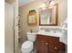 Bathroom featuring single sink vanity, toilet and shower at 2871 Humboldt Cir, Longmont, CO 80503