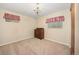 Bedroom showcasing a wooden dresser and carpeted floors with natural light at 2871 Humboldt Cir, Longmont, CO 80503