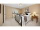 Comfortable bedroom with a plush bed and natural light from the window at 2871 Humboldt Cir, Longmont, CO 80503