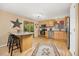 Bright, updated kitchen featuring wood cabinets, granite countertops, and modern stainless steel appliances at 2871 Humboldt Cir, Longmont, CO 80503