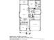 Floor plan showcasing the layout of the first floor, including the kitchen, bedrooms, and garage at 6140 Hourglass Dr, Brighton, CO 80601