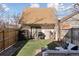 Landscaped backyard with a cozy lounge area, perfect for outdoor entertaining and relaxation at 701 W 6Th Ave, Denver, CO 80204