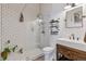 Bathroom with a glass enclosed shower, subway tile, and a modern sink with a rustic wood vanity at 701 W 6Th Ave, Denver, CO 80204
