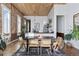 Stylish dining area showcases hardwood floors, modern lighting, and bright window at 701 W 6Th Ave, Denver, CO 80204
