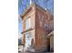 Brick exterior with visible signage, window details and neighborhood view at 701 W 6Th Ave, Denver, CO 80204