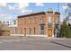 Historic brick building with charming architectural details and a corner lot at 701 W 6Th Ave, Denver, CO 80204