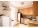 Bright kitchen featuring stainless steel appliances, granite countertops, and a window over the sink at 701 W 6Th Ave, Denver, CO 80204