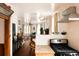 Open concept living and kitchen area with wood floors and a fireplace at 701 W 6Th Ave, Denver, CO 80204