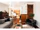 Spacious living area featuring hardwood floors, an open kitchen, and a comfortable lounge at 701 W 6Th Ave, Denver, CO 80204